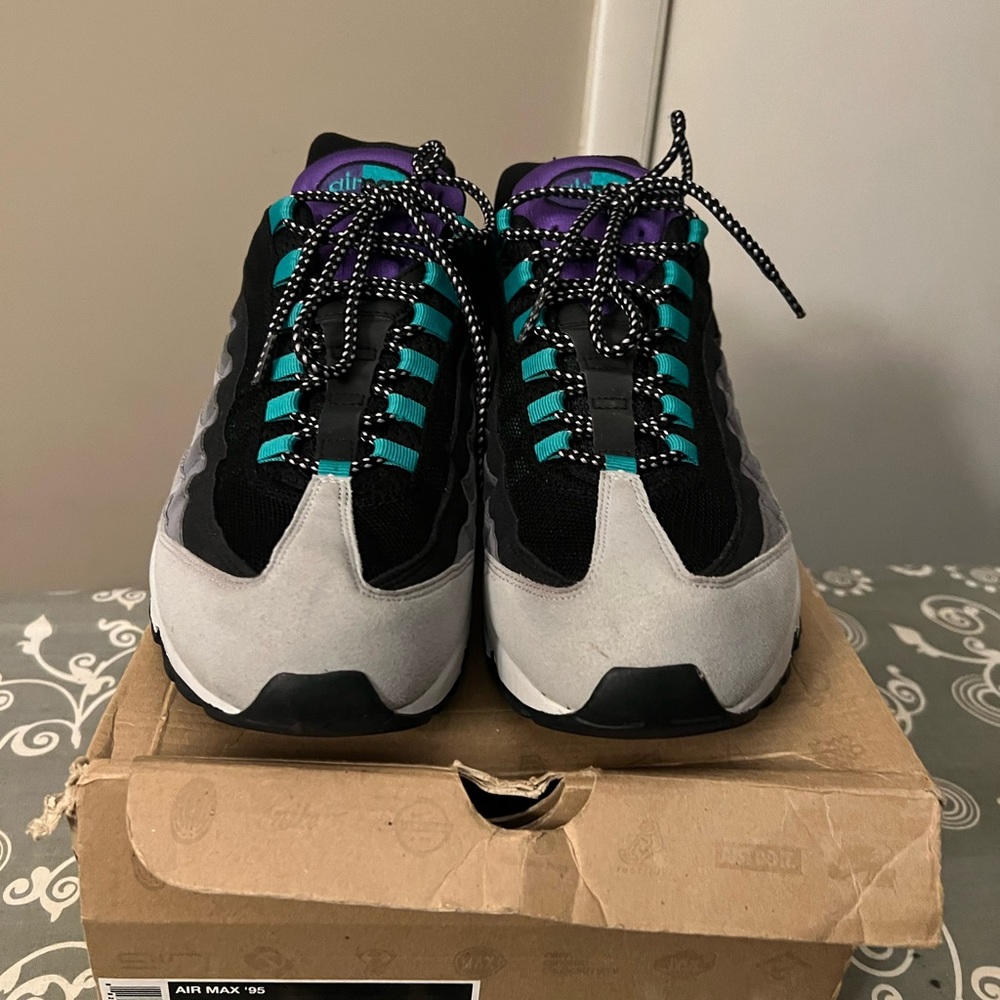 Mens Nike Air Max 95 in black, gray, teal and purple color way.